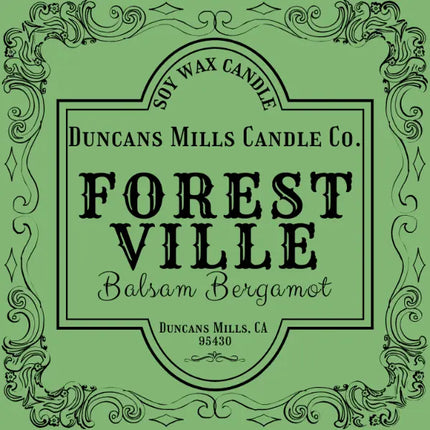 Duncan's Mills Candle Co. Forest Ville Balsam Bergamot candle label on a green background
