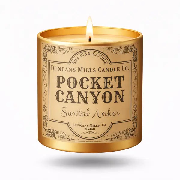 Candle with 'Pocket Canyon' label on a white background