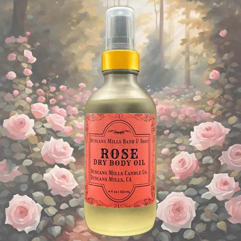 Rose dry body oil with floral rose notes in clear glass bottle by Duncans Mills Bath & Body