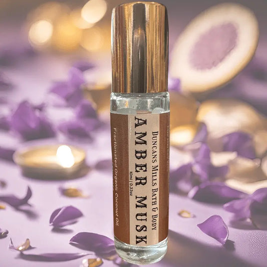 Amber Musk rollerball perfume in glass bottle with metal applicator by Duncans Mills Candle Co.