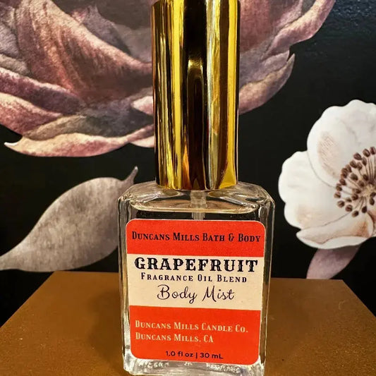 Grapefruit body mist eau de toilette in clear glass spray bottle by Duncans Mills Bath & Body