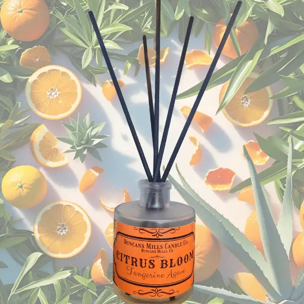 Citrus Bloom reed diffuser with tangerine and agave notes in glass bottle by Duncans Mills Candle Co.