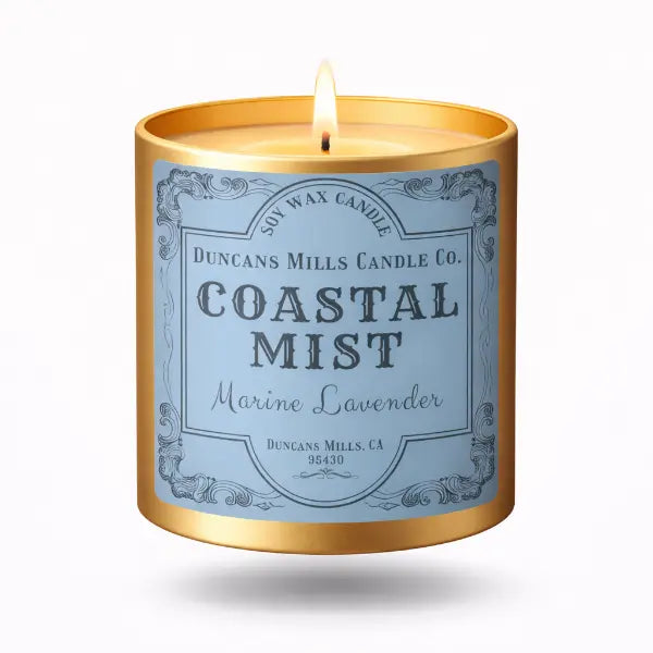 Candle with a label reading 'Coastal Mist' by Duncan's Mills Candle Co. on a white background.