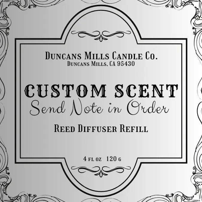 Label for Duncans Mills Candle Co. custom scent reed diffuser refill with decorative border.