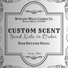 Label for Duncans Mills Candle Co. custom scent reed diffuser refill with decorative border.