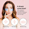 Woman with blue under eye gel patches on face.