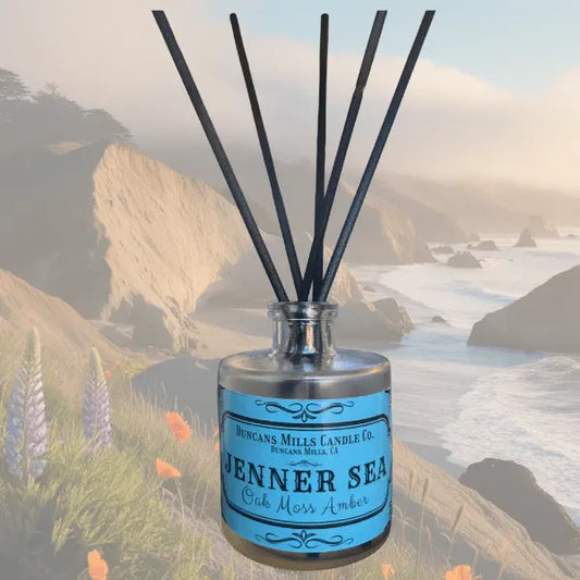 Jenner Sea reed diffuser with oakmoss and amber notes in glass bottle by Duncans Mills Candle Co.