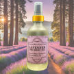 A frosted glass bottle of Lavender Body Oil nestled among lavender fields amongst redwood trees evoking a peaceful and calming skincare ritual