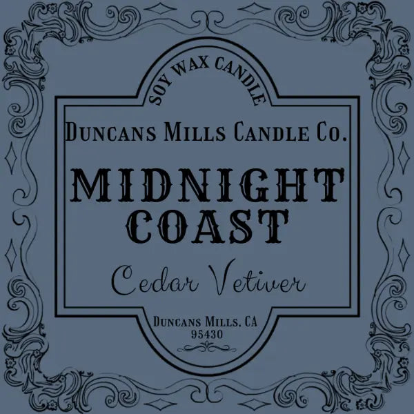 Label for Duncans Mills Candle Co. Midnight Coast Cedar Vetiver candle on a blue background