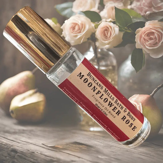 Moonflower Rose rollerball perfume in glass bottle with metal applicator by Duncans Mills Candle Co.