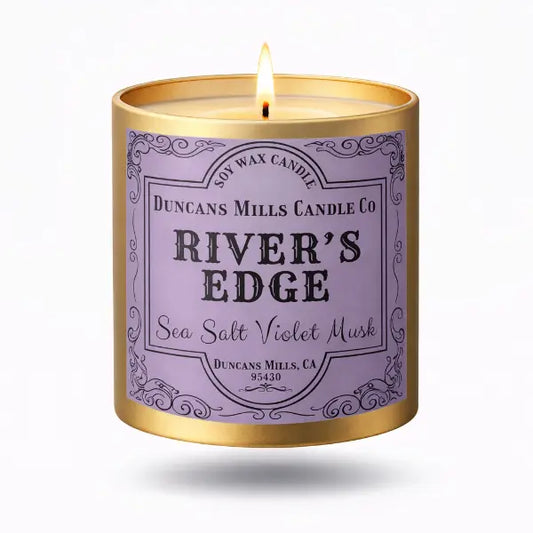 River's Edge soy wax candle with a purple label on a white background