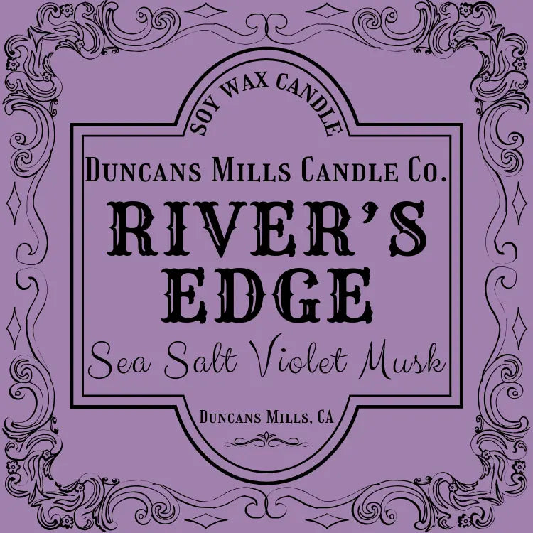 River's Edge soy wax candle with sea salt, violet and musk notes in tin by Duncans Mills Candle Co.
