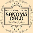 Duncan's Mills Candle Co. Sonoma Gold Vanilla Amber candle label on a beige background