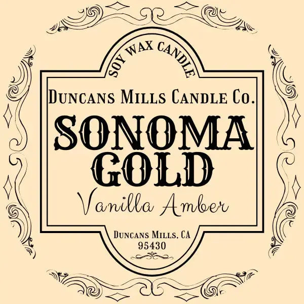 Duncan's Mills Candle Co. Sonoma Gold Vanilla Amber candle label on a beige background
