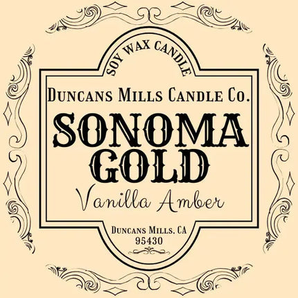 Duncan's Mills Candle Co. Sonoma Gold Vanilla Amber candle label on a beige background