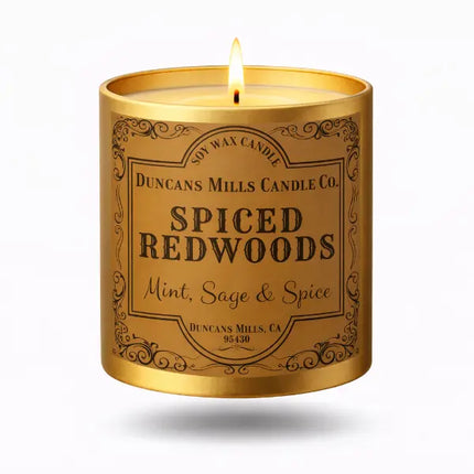 Candle with 'Spiced Redwoods' label on a white background
