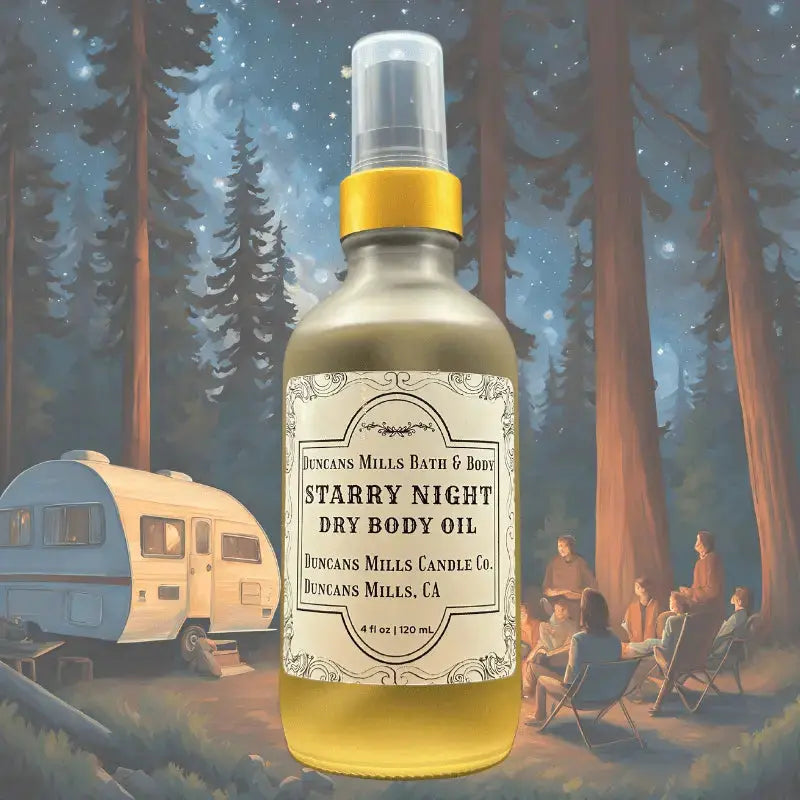 Starry Night dry body oil with pear, rose and musk in clear glass bottle by Duncans Mills Bath & Body