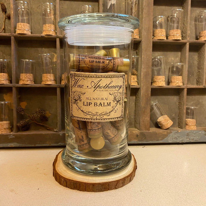 Lip Balms by Wax Apothecary in Apothecary Jar.