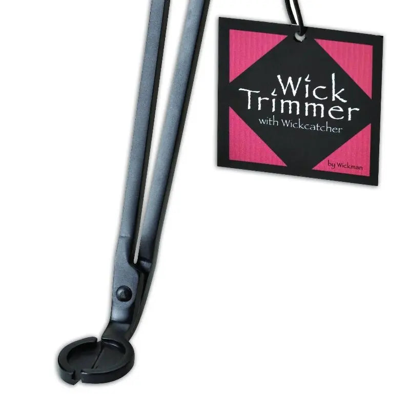 Matte black wick trimmer styled with soy candle for proper candle care by Duncans Mills Candle Co.